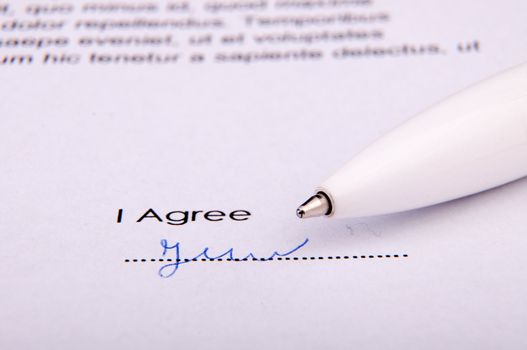 An image of signature over agreement