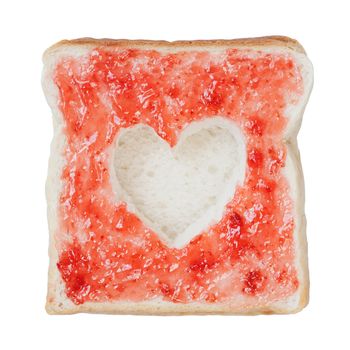 Slice of bread with fruit jam heart shape