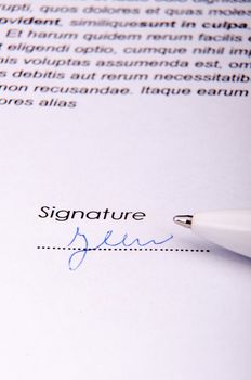 An image of signature over agreement