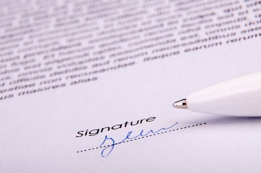 An image of signature over agreement