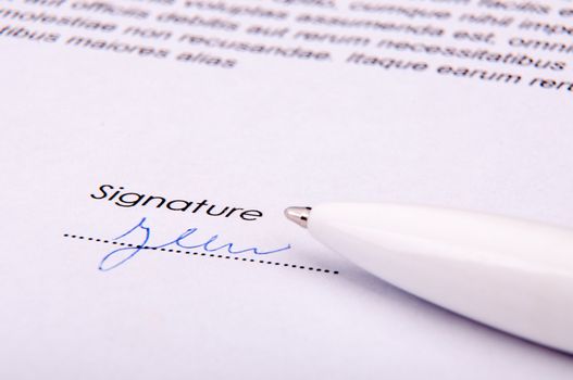 An image of signature over agreement