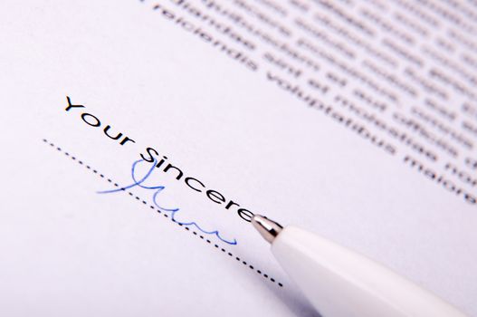 An image of signature over agreement