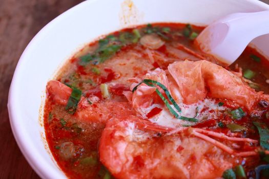 Tom Yam Koong soup with noodles