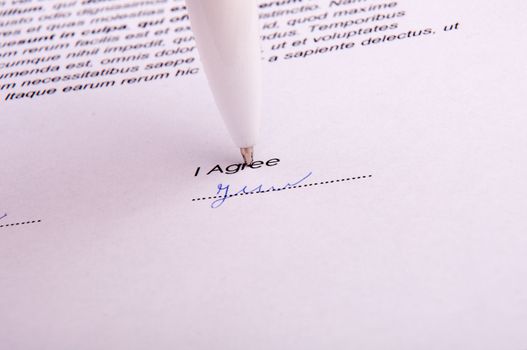 An image of signature over agreement
