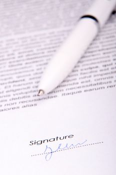 An image of signature over agreement
