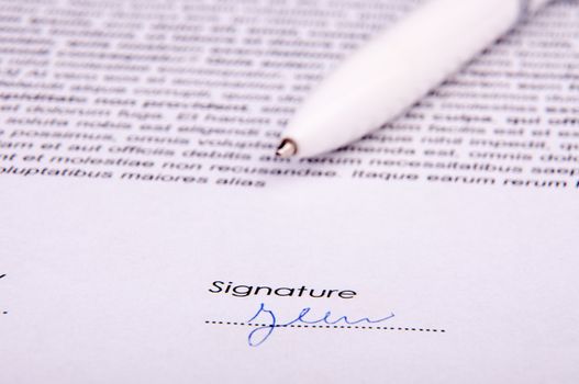 An image of signature over agreement