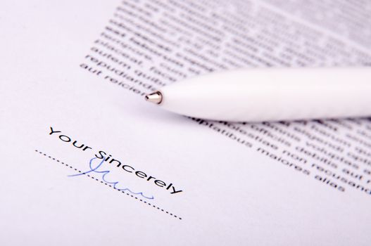 An image of signature over agreement