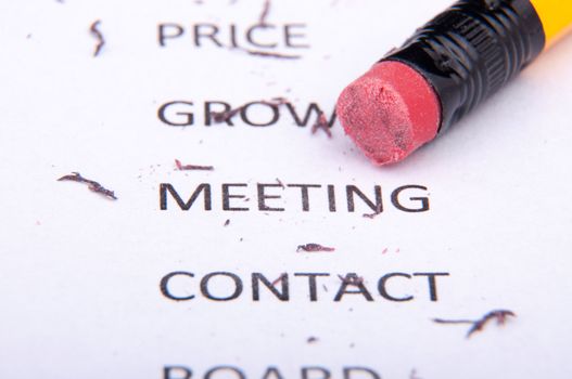 An image of business words and pencil