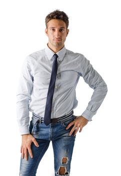 A different kind of young business man wearing shirt, tie and ripped jeans, isolated on white