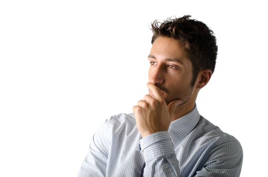 Portrait of attractive young business man looking to a side, isolated on white background