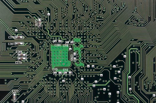 Closeup Detail of Printed Electronic Circuit Board with many Components, Horizontal shot