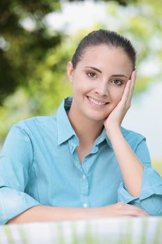 Portrait of smiling young woman outdoors