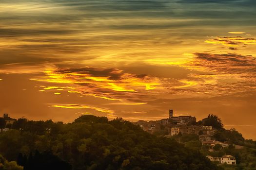 Romantic clouds in a Tuscany landscape at sunset