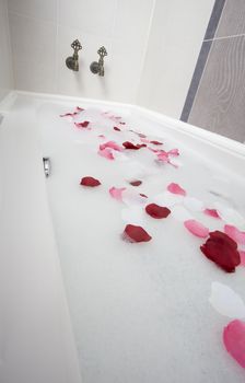 Bath water with rose petals