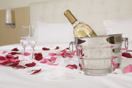 wine in bed to celebrate Valentine's Day at hotel room