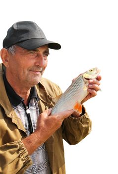 chub in the hand of fisherman