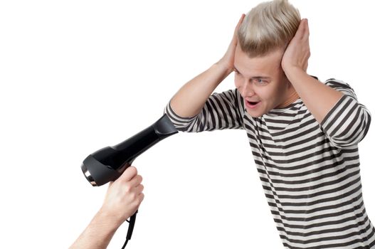 Portrait of handsome man with hairdryer in studio isolated on white