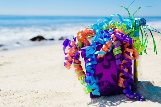 Birthday decorations on the sandy beach by the ocean