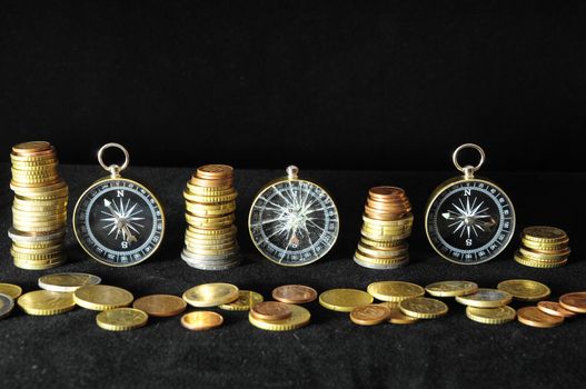 Orientation in  Business Compass and Money on a Black Background