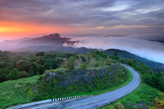 Sunrise behind mountain at Doi Intanon National Park VIew point, Chiang Mai Thailand