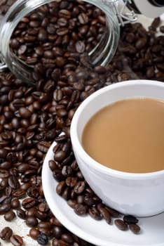 hot coffee cup and beans