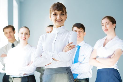 concept of teamwork, business woman crossed her arms over her team