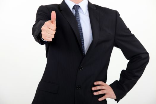 businessman making a thumbs up sign