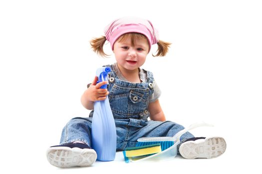 Sweet little girl doing housework 