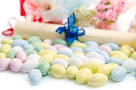 different colored candy favor on white background
