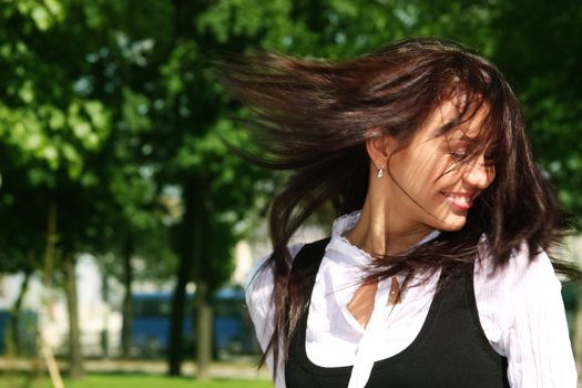 Happy young woman. Outdoor portrait