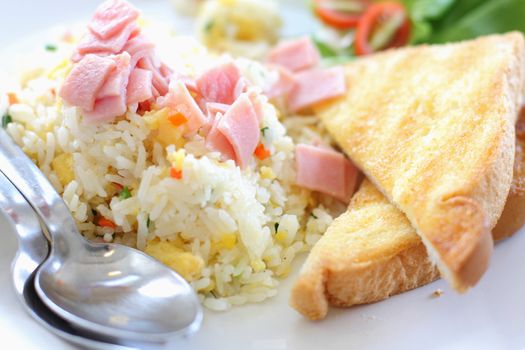 Fried rice with ham, served with toast