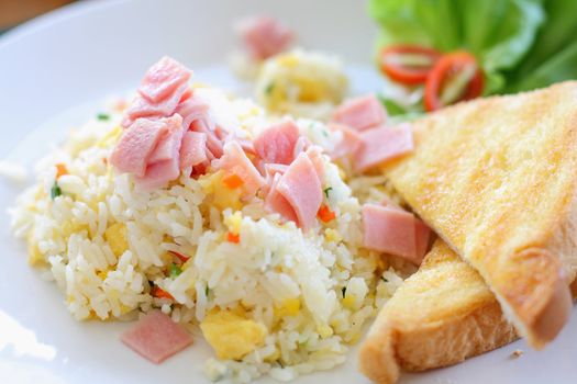 Fried rice with ham, served with toast