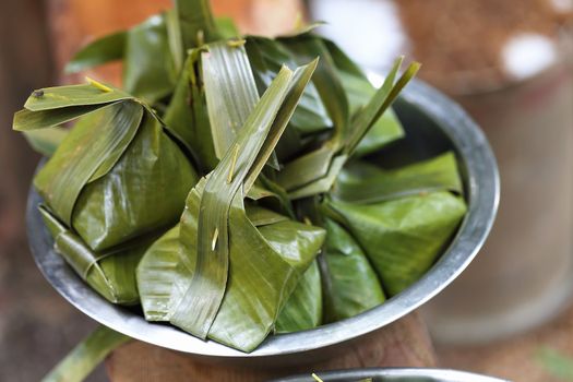 Sweets wrapped in banana leaves.