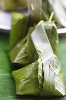 Sweets wrapped in banana leaves.