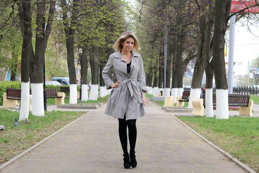 beautiful young woman walking on the street
