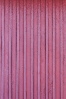 Frost red wall of wooden house at winter