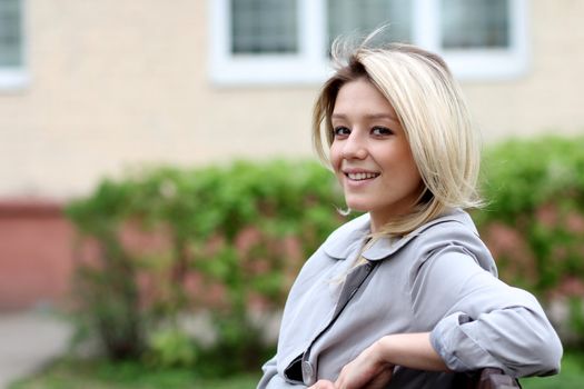 Beautiful young woman in the street