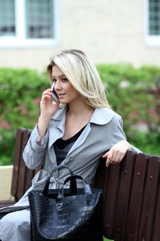 portrait of young woman talking on mobile phone