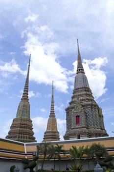 An ornate Thai temple with blue skies