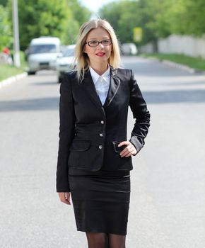 beautiful young woman walking on the street
