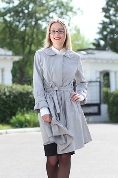 beautiful young woman walking on the street