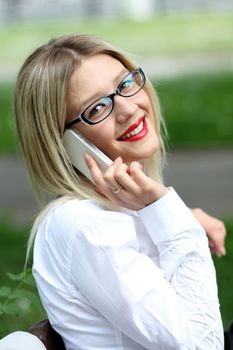 portrait of young woman talking on mobile phone