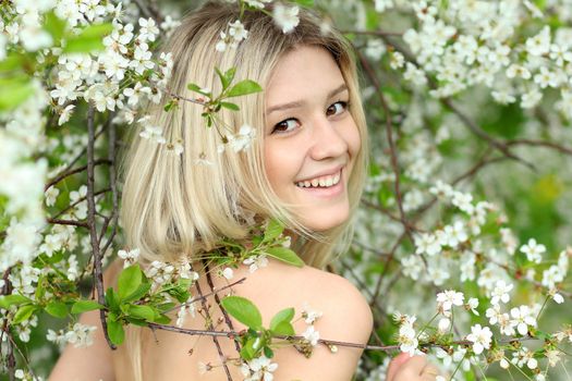 Beautiful woman in spring park