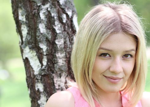 Beautiful young girl smiling. Outdoor portrait