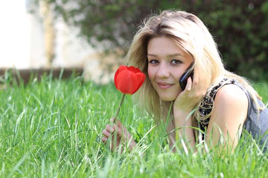 portrait of young woman talking on mobile phone