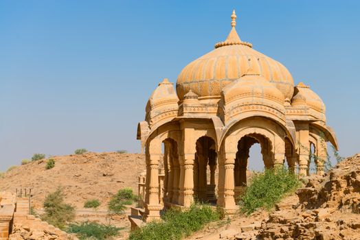 Chhatris on ruins of the royal cenotaphs of ancient Maharajas rulers in Bada Bagh, also called Barabagh (literally Big Garden), Jaisalmer, India