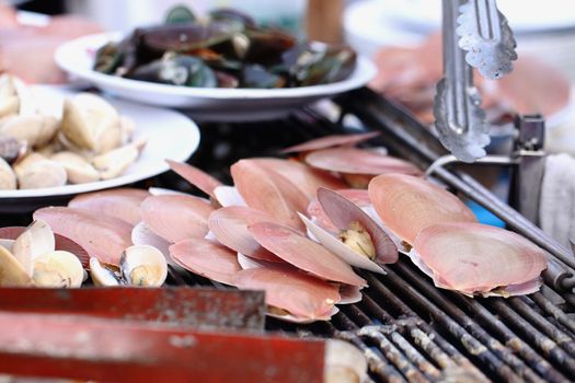 Grilled scallops on the grill.