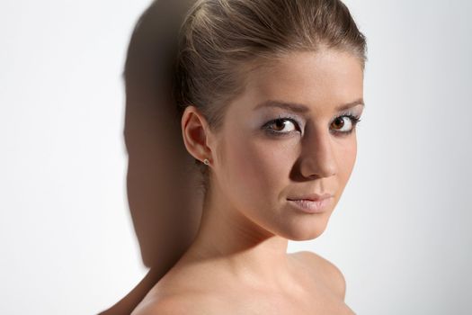 Portrait of young beautiful blond girl