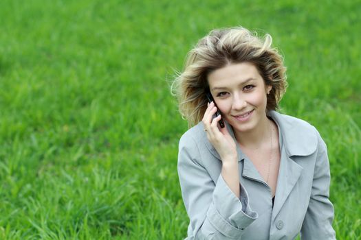 portrait of young woman talking on mobile phone