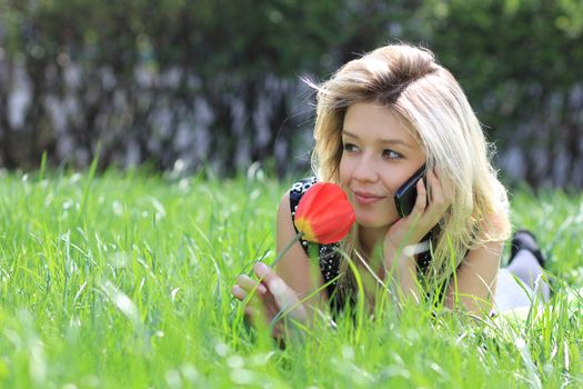 portrait of young woman talking on mobile phone
